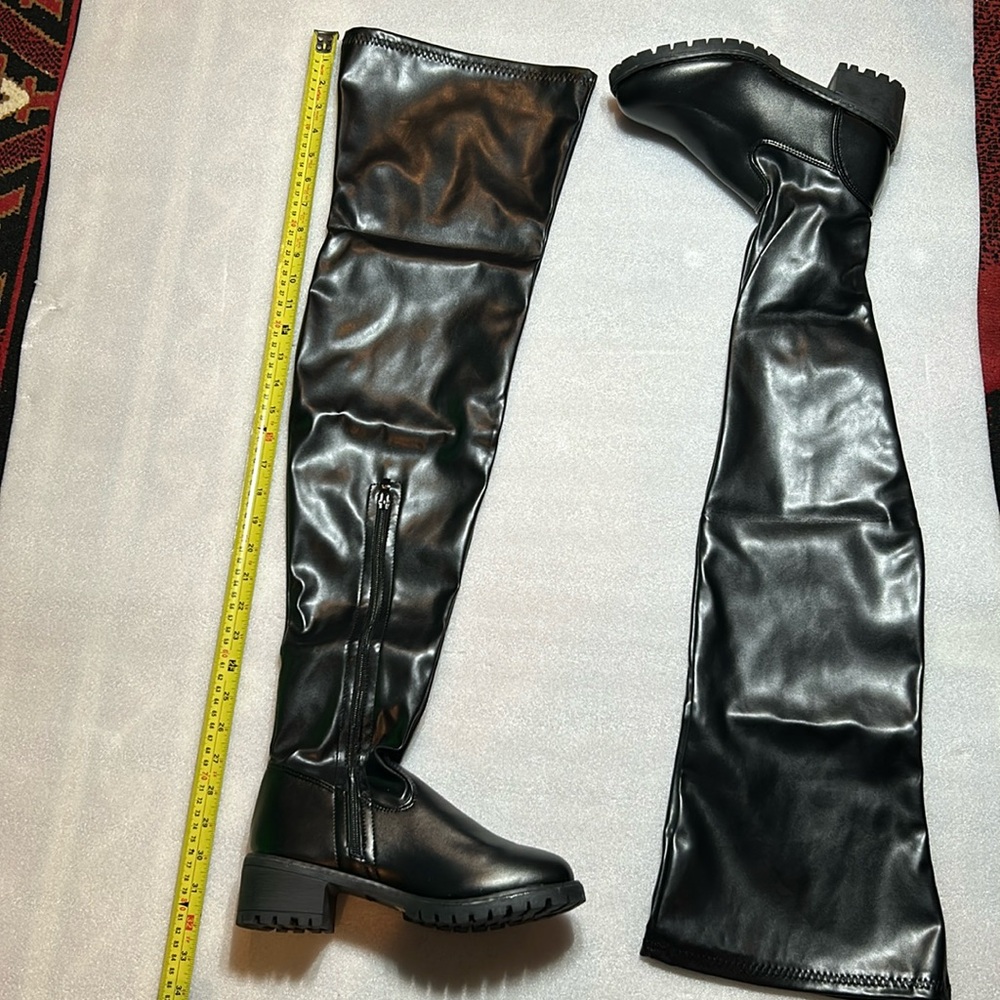 Black thigh high PU boots. Size 9. NIB